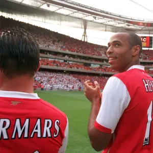 Thierry Henry (Arsenal) line up with the Legends