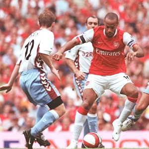 Thierry Henry (Arsenal) Olof Mellberg (Villa)