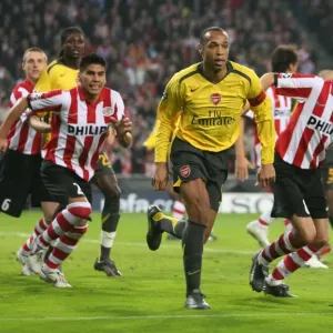 Thierry Henry (Arsenal) Phillip Cocu and Carlos Salcidio (PSV) Thierry Henry (Arsenal) Phillip Cocu and Carlos Salcidio (PSV)