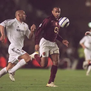 Thierry Henry (Arsenal) Raul Bravo (Real Madrid)