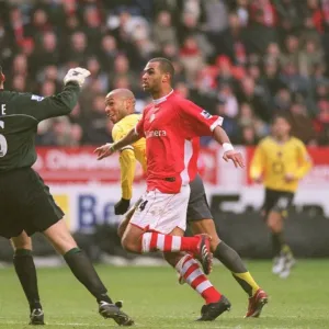 Thierry Henry (Arsenal) Thomas Myhre and Jonathan Fortune (Charlton)