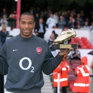 Thierry Henry (Arsenal)with his golden boot awards