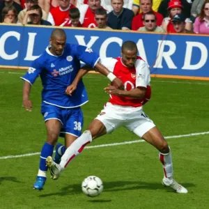 Thierry Henry and Ashley Cole (Arsenal) Marcu Bent (Leicester)