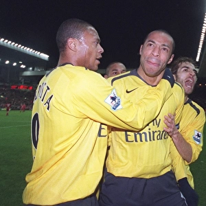 Thierry Henry celebrates scoring the 3rd Arsenal goal with Julio Baptista