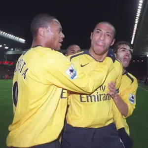 Thierry Henry celebrates scoring the 3rd Arsenal goal with Julio Baptista