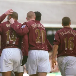 Thierry Henry celebrates scoring Arsenals 1st goal with Alex Hleb