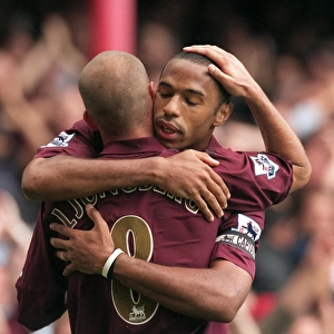 Thierry Henry celebrates scoring Arsenals 1st goal from the penalty spot with Freddie Ljungberg