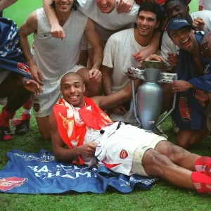 Thierry Henry and teammates celebrate League win Print