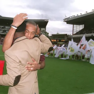 Thierry Henry is presented with a golden cannon by Ian Wright for becoming Arsenals all time record goalscorer. Arsenal 1: 0 Manchester City. FA Premier League. Arsenal Stadium, Highbury, London, 22 / 10 / 05. Credit: Arsenal Football Club /