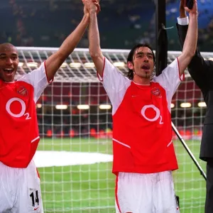 Thierry Henry, Robert Pires and Patrick Vieira (Arsenal) celebrate at the end of the match