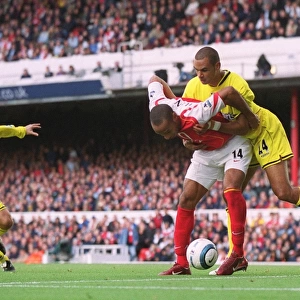 Thierry Henry scores his 1st goal, Arsenals 2nd, under pressure from Jonathan Fortune