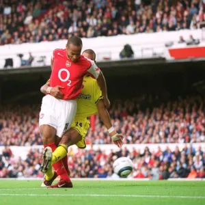 Thierry Henry scores his 1st goal (Arsenals 2nd) under pressure from Jonathan Fortune