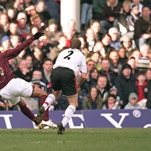 Thierry Henry scores Arsenals 1st goal under pressure from Moritz Volz (Fulham)