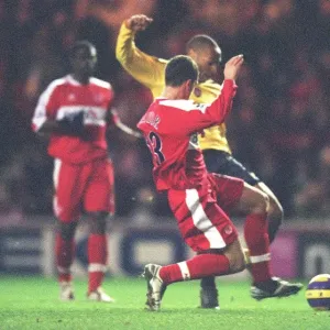 Thierry Henry shoots past Andrew Taylor and Middlesbrough goalkeeper Brad Jones to score the Arsenal goal. Middlesbrough 1: 1 Arsenal, The Premiership, The Riverside Stadium, Middlesbrough, 3 / 2 / 2007. Credit: Stuart MacFarlane / Arsenal