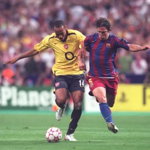 Thierry Henry vs. Carlos Puyol: The Legendary Battle in the 2006 UEFA Champions League Final - Barcelona vs. Arsenal