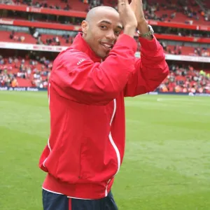 Thierry Henry waves to the Arsenal fans before the match