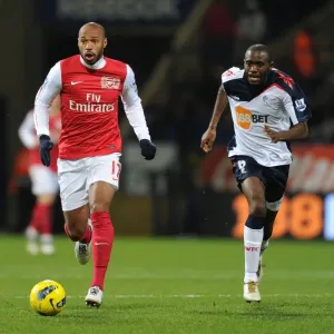 Thierry Henry's Agile Outmaneuver of Fabrice Muamba: A Premier League Legend's Moment, 2012 Thierry Henry's Agile Outmaneuver of Fabrice Muamba: A Premier League Legend's Moment, 2012