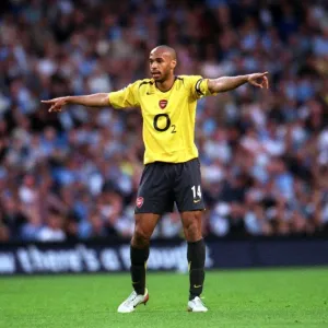 Thierry Henry's Brilliant Hat-Trick: Arsenal Crushes Manchester City 3-1 in FA Premiership
