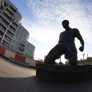 Thierry Henry's Enduring Legacy: A Statue of Greatness at Emirates Stadium during Europa League Play