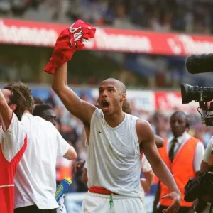 Thierry Henry's Euphoric Celebration: Arsenal Clinch the Premier League Title at White Hart Lane (2004) Thierry Henry's Euphoric Celebration: Arsenal Clinch the Premier League Title at White Hart Lane (2004)