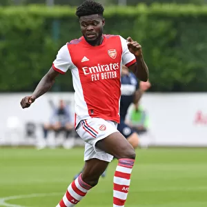 Thomas Partey in Action: Arsenal's Pre-Season Battle against Millwall