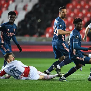 Thomas Partey vs Jakub Hromada: Arsenal's Europa League Battle at Empty Eden Arena Against Slavia Praha