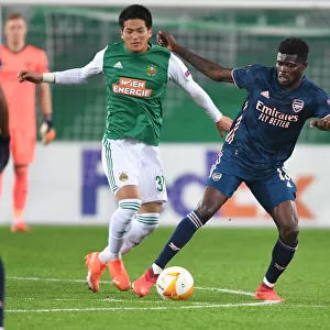 Thomas Partey's Europa League Breakthrough: Surging Past Rapid Wien's Koya Kitagawa