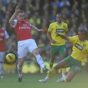 Thomas Vermaelen (Arsenal) Kyle Naughton (Norwich). Norwich City v Arsenal