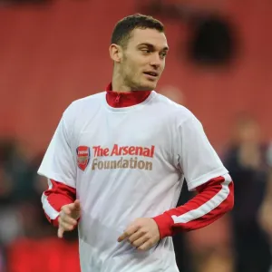 Thomas Vermaelen (Arsenal) warms up in his Arsenal Foundation T Shirt before the match Thomas Vermaelen (Arsenal) warms up in his Arsenal Foundation T Shirt before the match