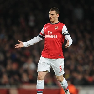 Thomas Vermaelen: Arsenal's Focused Defender in Action Against Swansea City (2013-14)