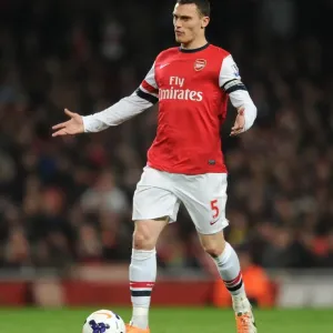 Thomas Vermaelen: Arsenal's Focused Defender in Action Against Swansea City (2013-14)