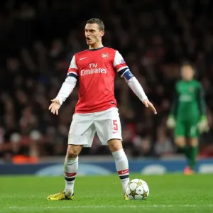 Thomas Vermaelen: Arsenal's Unyielding Defender in Action against Montpellier, UEFA Champions League 2012-13