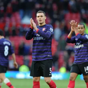 Thomas Vermaelen Celebrates with Arsenal Fans: Manchester United vs. Arsenal (2012-13) Thomas Vermaelen Celebrates with Arsenal Fans: Manchester United vs. Arsenal (2012-13)