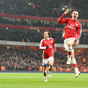 Thomas Vermaelen celebrates scoring the 3rd Arsenal goal with Tomas Rosicky