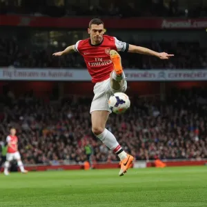Thomas Vermaelen Focuses in Arsenal's Battle Against West Ham United (2013/14) Thomas Vermaelen Focuses in Arsenal's Battle Against West Ham United (2013/14)