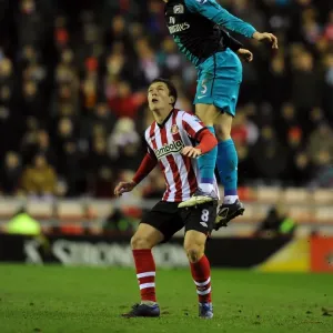 Thomas Vermaelen Leaps Over Craig Gardner: Sunderland vs Arsenal, FA Cup 2012
