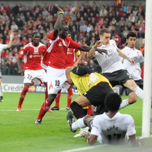 Thomas Vermaelen shoots past Liege goalkeeper Sinan Thomas Vermaelen shoots past Liege goalkeeper Sinan