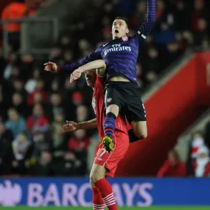 Thomas Vermaelen Soaring Above Rickie Lambert: Arsenal vs. Southampton, Premier League 2012-13 - Aerial Battle Thomas Vermaelen Soaring Above Rickie Lambert: Arsenal vs. Southampton, Premier League 2012-13 - Aerial Battle