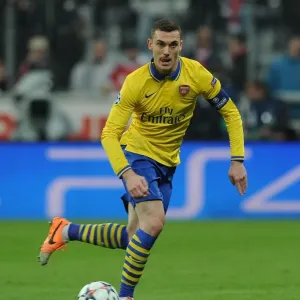 Thomas Vermaelen's Determined Performance in Arsenal's UEFA Champions League Battle at Allianz Arena (2013-14) Thomas Vermaelen's Determined Performance in Arsenal's UEFA Champions League Battle at Allianz Arena (2013-14)
