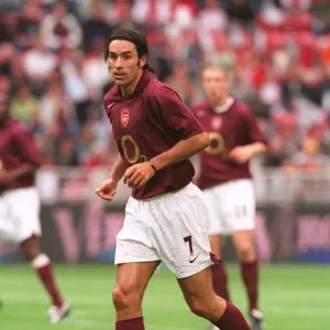Thrilling Victory: Robert Pires Scores the Winning Goal for Arsenal at Amsterdam Tournament, 2005 Thrilling Victory: Robert Pires Scores the Winning Goal for Arsenal at Amsterdam Tournament, 2005