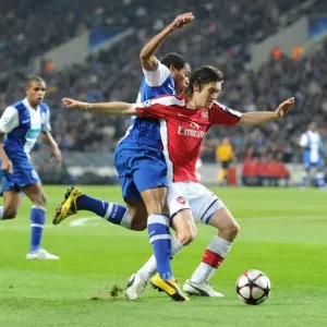 Tomas Rosicky (Arsenal) Alvaro Pereria (Porto). FC Porto 2: 1 Arsenal, UEFA Champions League