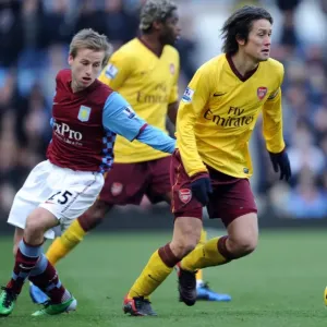 Tomas Rosicky (Arsenal) Barry Bannan (Villa). Aston Villa 2: 4 Arsenal. Barclays Premier League Tomas Rosicky (Arsenal) Barry Bannan (Villa). Aston Villa 2: 4 Arsenal. Barclays Premier League