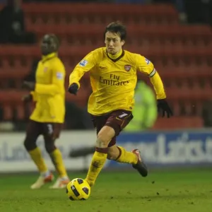 Tomas Rosicky (Arsenal) Ben Watson (Wigan). Wigan Athletic 2: 2 Arsenal