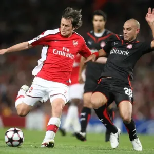 Tomas Rosicky (Arsenal) Cristian Ledesma (Olympiacos)