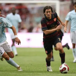 Tomas Rosicky (Arsenal) Guglielmo Stendardo (Lazio)