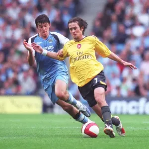 Tomas Rosicky (Arsenal) Joey Barton (Man City) Tomas Rosicky (Arsenal) Joey Barton (Man City)
