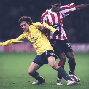 Tomas Rosicky (Arsenal) Mikele Leigertwood (Sheff Utd) Tomas Rosicky (Arsenal) Mikele Leigertwood (Sheff Utd)