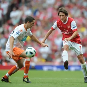 Tomas Rosicky (Arsenal) Neal Eardley (Blackpool). Arsenal 6: 0 Blackpool