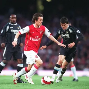 Tomas Rosicky (Arsenal) Nedum Onuoha and Joey Barton (Man City)