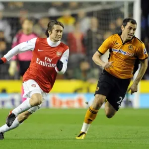 Tomas Rosicky (Arsenal) Nenad Milijas (Wolves). Wolverhampton Wanderers 0: 2 Arsenal